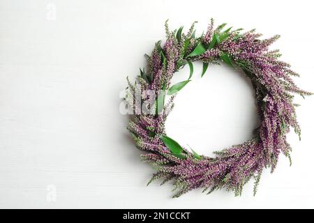 Beautiful Autumnal Wreath With Heather Flowers On Light Grey Background 