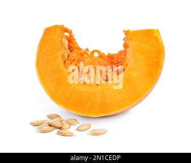 Piece of ripe orange pumpkin and seeds isolated on white Stock Photo