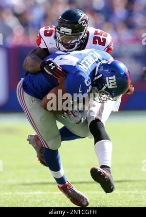 Atlanta Falcons safety William Moore (25) runs off the field after