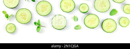 Fresh cucumber and mint on a white background, panorama with a place for text, top shot. Healthy organic food Stock Photo