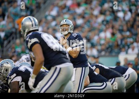 Dallas Cowboys Tony Romo calls a play in the huddle as his team plays the  Detroit Lions in a NFL Wild Card Game at AT&T Stadium in Arlington, Texas  on January 4, 2015. The Cowboys won 24-20 and advance to face the Green Bay Packers  next