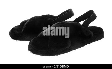 Pair of soft slippers with black fur on white background Stock Photo