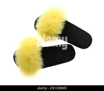 Pair of soft open toe slippers with yellow fur on white background, top view Stock Photo