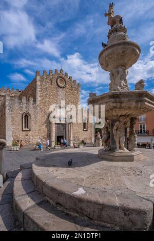 View of Duomo di Taormina and fountain in Piazza del Duomo in Taormina, Taormina, Sicily, Italy, Mediterranean, Europe Stock Photo