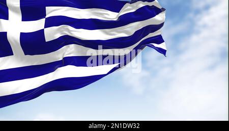 National flag of Greece waving in the wind on a clear day. Greece is a country at the crossroads of Central and Southeast Europe. Fluttering fabric. R Stock Photo