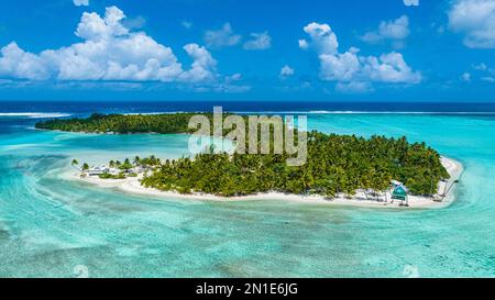 Aerial of a little islet with a white sand beach, Maupiti, Society Islands, French Polynesia, South Pacific, Pacific Stock Photo