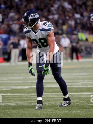 Seattle Seahawks tight end Jimmy Graham (88) stiff arms his way to a first  down against Pittsburgh Steelers cornerback Ross Cockrell (31) at  CenturyLink Field in Seattle, Washington on November 29, 2015.