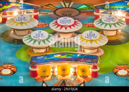 Drempt, The Netherlands - September 3, 2021: Close up of a vintage illuminated pinball machine in Drempt, The Netherlands Stock Photo