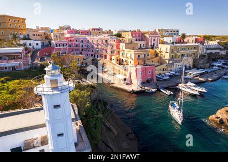 Colourful houses of Ventotene and the Roman port in sunshine, Pontine Islands, Tyrrhenian Sea, Latina province, Latzio, Italy, Europe Stock Photo