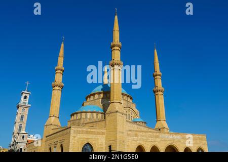 St. George Maronite Cathedral bell tower and Mohammed al-Amine Sunni Mosque, Beirut, Lebanon, Middle East Stock Photo