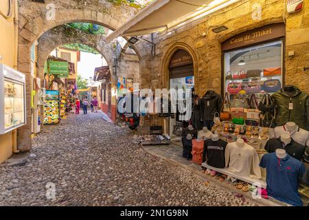 View of shops in cobbled street, Old Rhodes Town, UNESCO World Heritage Site, Rhodes, Dodecanese, Greek Islands, Greece, Europe Stock Photo