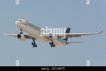 The Airbus A330-343  Saudia airline arriving at dubai international airport Stock Photo