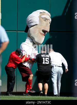 Washington Nationals' mascot Thomas Jefferson runs the warning track in  between innings as the Washington Nationals play the Philadelphia Phillies  at Nationals Park in Washington on April 13, 2009. (UPI Photo/Kevin Dietsch