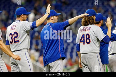 New York Mets pitchers Noah Syndergaard, Jacob deGrom and Matt Harvey (L to  R) walk in from the bullpen prior to playing the Los Angeles Dodgers in  game 4 of the NLDS