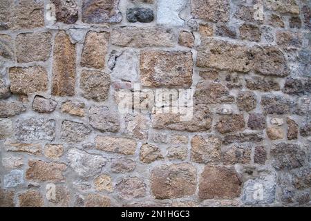 old natural stone wall, rustic stone wall, Stock Photo