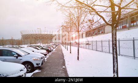 Warsaw, Poland. 13 January 2021. Fresh snow on cars. A thin layer of delicate white down on a frozen glass. Frost and winter road conditions. Stock Photo