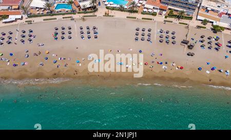 Picture dated July 14th shows the lucky holiday makers who have made it onto  the beach in Cala San Vicente,Ibiza,on Thursday morning.Many travellers Stock Photo