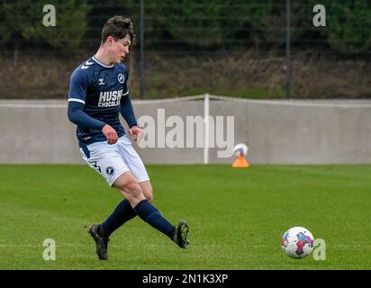 Swansea, Wales. 4 February 2023. Oliver Evans of Millwall under pressure  from Zane Myers of Swansea City during the Professional Development League  game between Swansea City Under 18 and Millwall Under 18