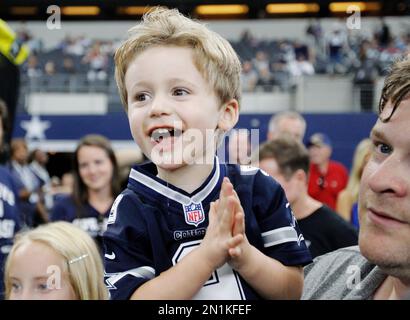 Dallas Cowboys star Tony Romo shows off son Hawkins in matching  sportswear