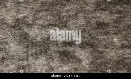 the wrong side of a textile product in a black and white mesh texture close-up as a background abstraction, a black and white grainy backdrop Stock Photo
