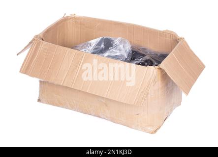 Battered cartboard box isolated on a white background Stock Photo