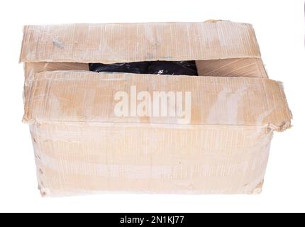 Battered cartboard box isolated on a white background Stock Photo