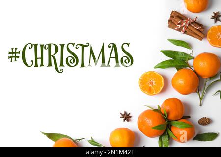 Hashtag Christmas, ripe tangerines, cinnamon sticks and anise stars on white background, flat lay Stock Photo