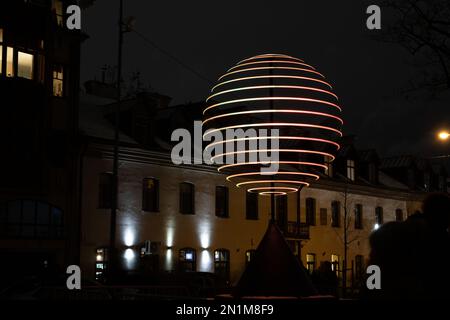 photo luminous installation on the city street at night Stock Photo