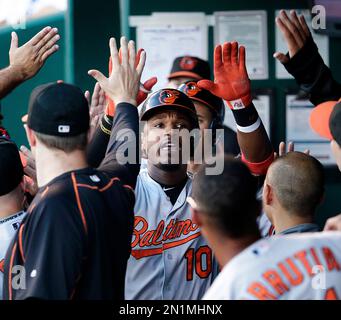 Baltimore Orioles Adam Jones (10), forced at second base, yells to Nelson  Cruz, who scored an RBI on the fielder's choice in the fifth inning against  the Kansas City Royals in game