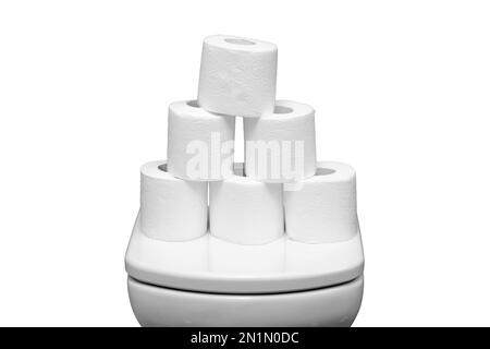 Pyramid of toilet paper rolls on the bowl, isolated on a white background Stock Photo