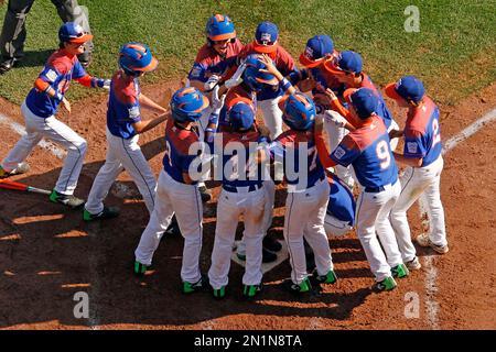 Bowling Green Kentucky s Carson Myers center is welcomed by