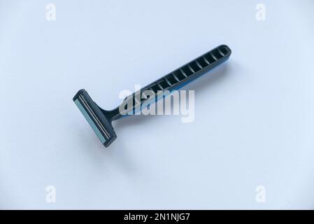 Disposable razor isolated on a white background. Stock Photo
