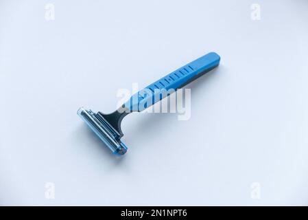 Disposable razor isolated on a white background. Stock Photo