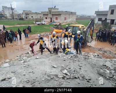 Idlib, Syria. 06th Feb, 2023. Rescue teams search for victims in the rubble following an earthquake in northwestern Syrian Idlib in the rebel-held part of Idlib province, on February 6, 2023. - Hundreds have been reportedly killed in Turkey and Syria after a 7.8-magnitude earthquake that originated in Turkey and was felt across Middle East countries. Photo by Syria Civil Defense/UPI Credit: UPI/Alamy Live News Stock Photo