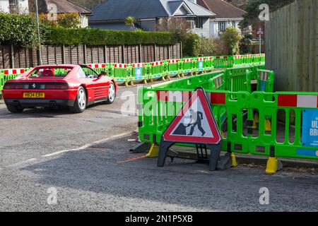 Work being undertaken by City Fibre to install a brand new ultrafast broadband network in the area at Poole, Dorset UK in February Stock Photo