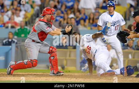 Yasiel Puig getting through Tucker Barnhart makes for a great visual