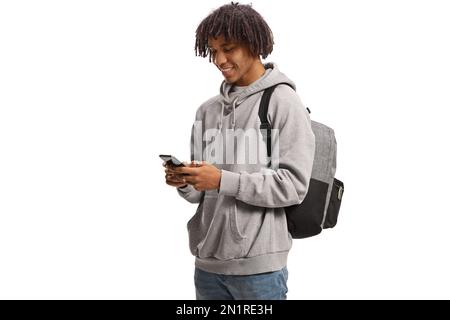 Happy african american male student using a smartphone isolated on white background Stock Photo