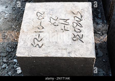 Manually made concreate block for protect land from river. Concrete bolder stock on near of river Stock Photo