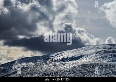 Late winter clouds over Cheviot in the Harthope Valley, Northumberland National Park, England Stock Photo