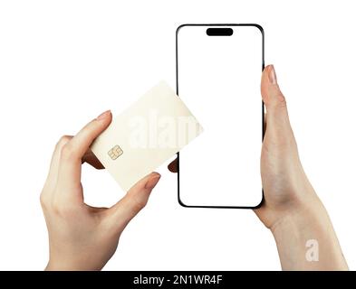 Lodz, Poland February 05 2023 Mobile phone screen mock-up and hand holding plastic credit card mockup for paying online, shopping via internet isolate Stock Photo