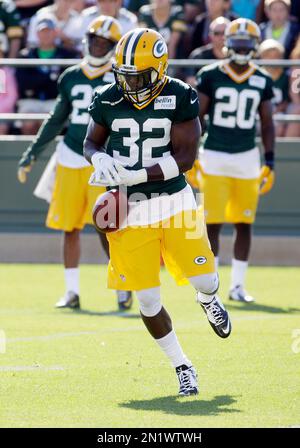 Green Bay Packers' Chris Banjo (32) and Aaron Ripkowski (22) fire up the  crowd after a kickoff return against the Washington Redskins during the  second half of their NFC Wild Card game