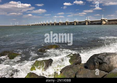 Storm flood barrier / Oosterscheldekering / Eastern Scheldt storm surge barrier at Neeltje Jans, part of the Delta Works in Zeeland, the Netherlands Stock Photo