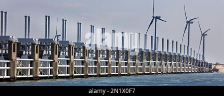 Storm flood barrier / Oosterscheldekering / Eastern Scheldt storm surge barrier at Neeltje Jans, part of the Delta Works in Zeeland, the Netherlands Stock Photo