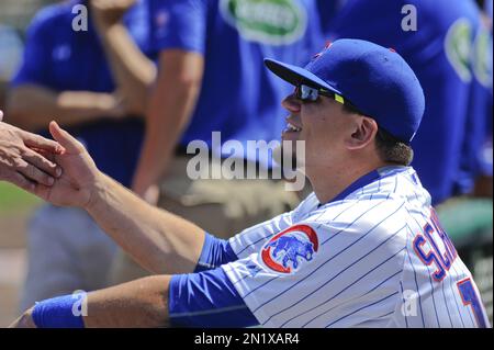 Chicago Cubs catcher Kyle Schwarber (12) between innings during a game  against the Atlanta Braves on July 18, 2015 in Atlanta, Georgia. The Cubs  defeated the Braves 4-0. (Tony Farlow/Four Seam Images