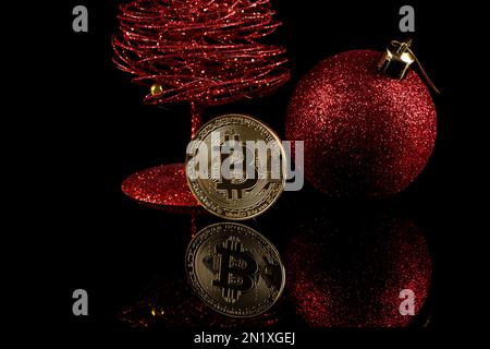 Physical version of Bitcoin coin aka virtual money. Cryptocurrency and digital payment Stock Photo