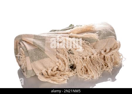 One new wrapped cotton carpet, macro isolated on white background. Stock Photo