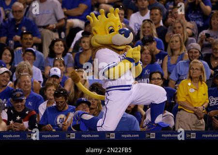 Kansas City Royals mascot Sluggerrr kicks up his heals while wearing an  Irish-themed hat before a game against the Minnesota Twins on Wednesday,  Aug. 27, 2014, at Kauffman Stadium in Kansas City