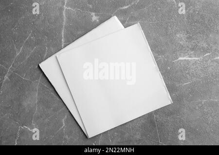 Clean napkins on marble table, top view Stock Photo