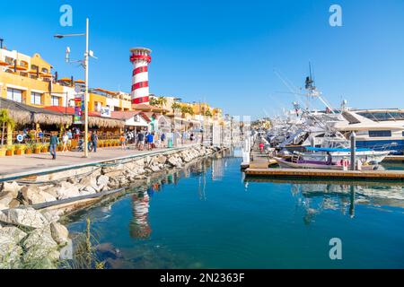 The colorful and busy cruise port with shops, cafes and boats in the marina along the Mexican Riviera at Cabo San Lucas, Mexico. Stock Photo