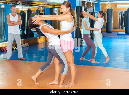 Woman training eye-gouging movement Stock Photo